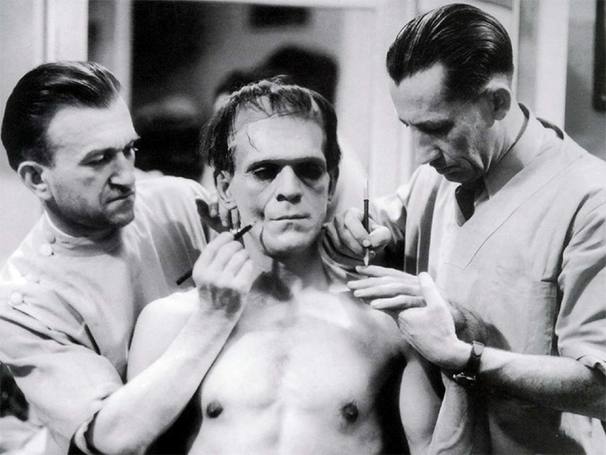 Jack Pierce working on Boris Karloff as Frankenstein